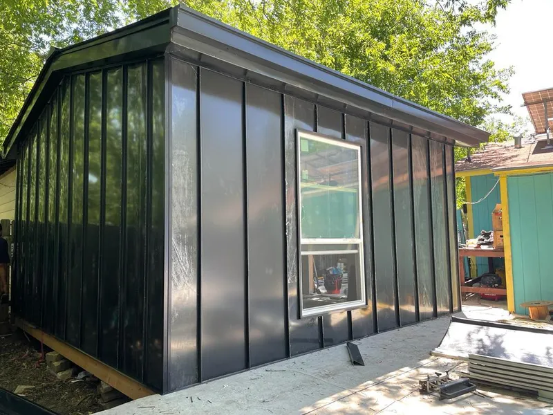 Black standing seam metal wall panels for Metal Roof Installation in Fairburn